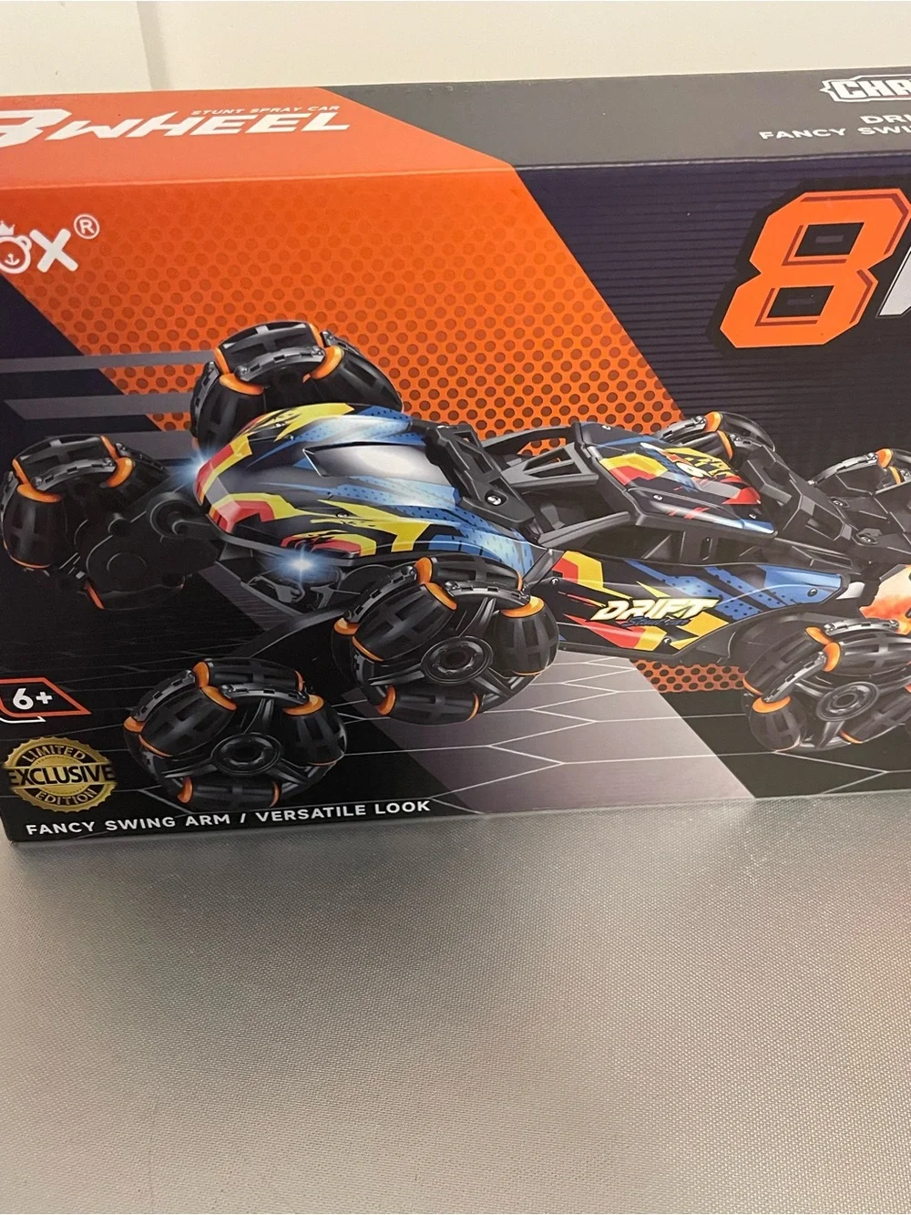 Nexbox 8-Wheel Stunt Spray RC Car - Black with Orange Accent NIP